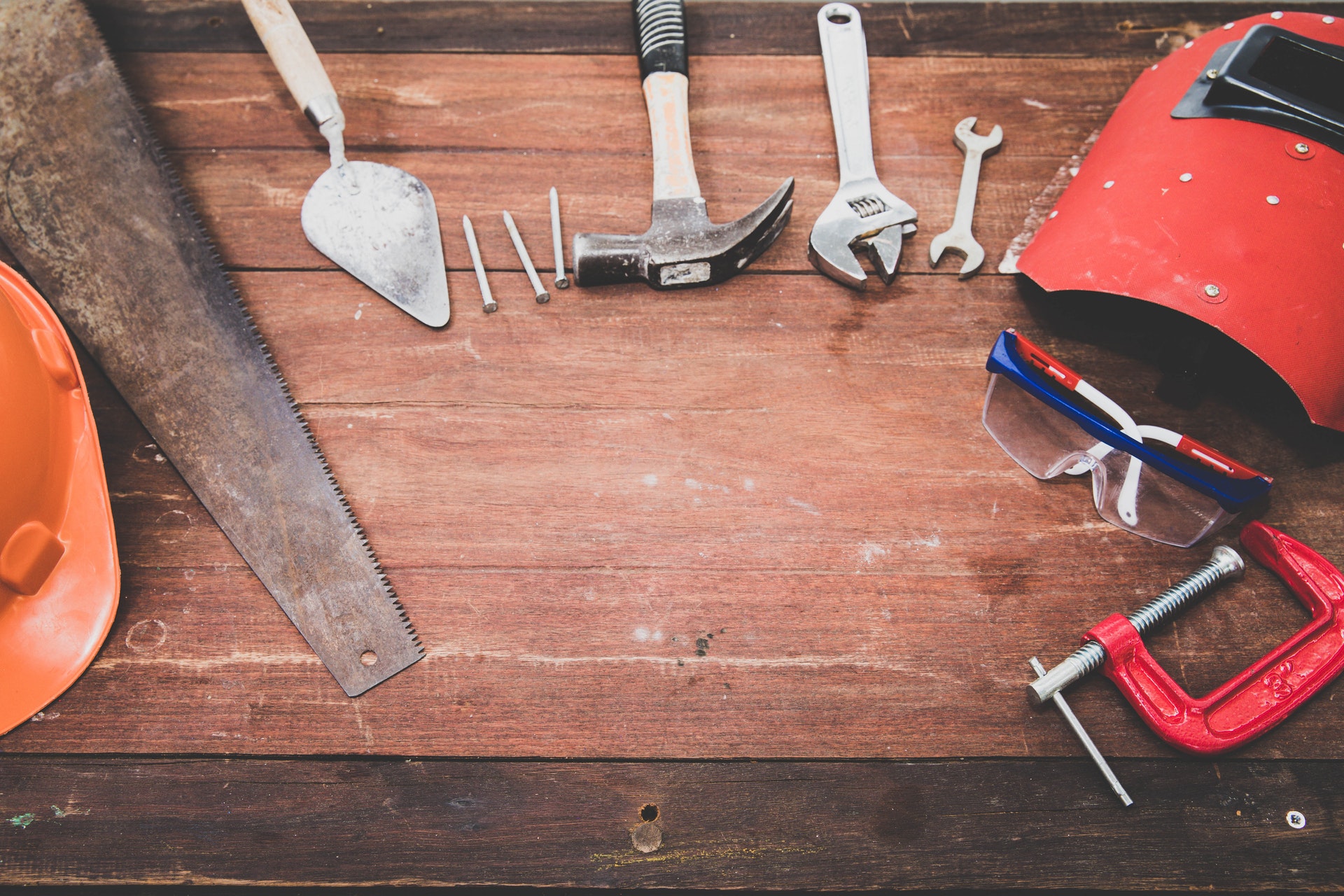 Tools laid out on wood.